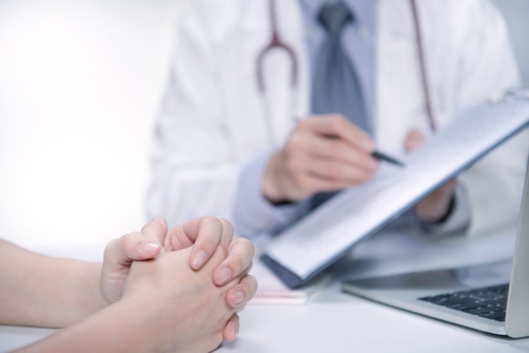 doctor-consults-with-patient-in-modern-office-2026-03-17-05-03-57-utc (1)
