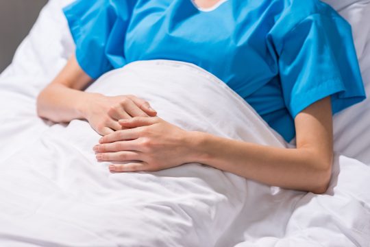 cropped-image-of-sick-woman-lying-on-hospital-bed-2026-01-06-00-40-00-utc (1)